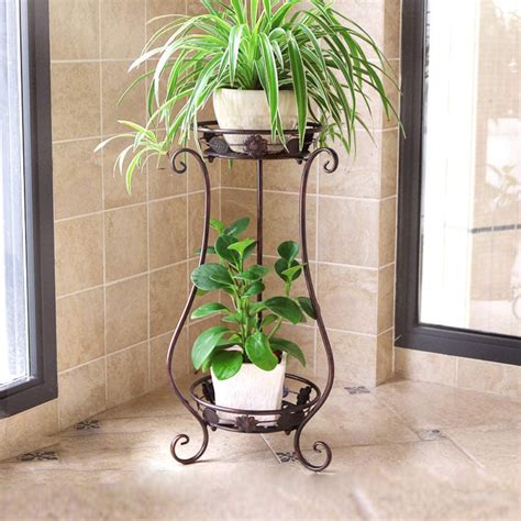 IndoorOutdoor Wood Plant Stand - 3-Tiered Ladder Plant Shelf for 7 Pots, Boho Home Decor, Plant Holder Table, Perfect Gift for Gardening. . Wrought iron plant stands indoor